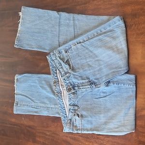 Tommy Hilfiger jeans. Distressed, light wash, worn pattern, size 8, boot cut